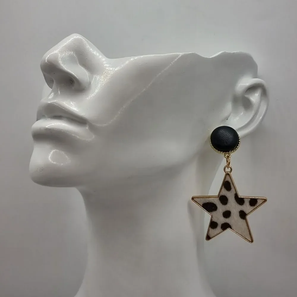 FREE PEOPLE City slickers faux cow hyde star earrings | NWOT